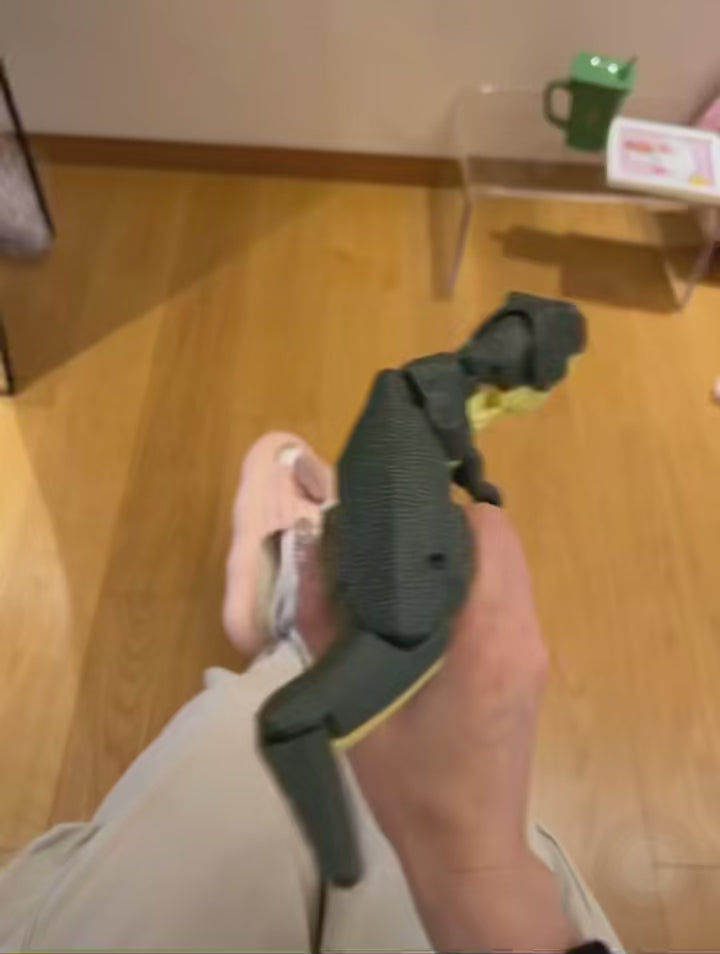 Hand-operated Dinosaur